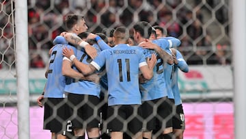 Uruguay's players celebrate a goal by teammate Sebastian Coates Nion against South Korea during a friendly football match between South Korea and Uruguay in Seoul on March 28, 2023. (Photo by JUNG YEON-JE / AFP)