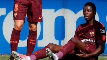 Dembel&eacute; , tras sufrir una lesi&oacute;n, durante el partido contra el Getafe.