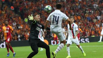 Istanbul (Turkey), 01/10/2019.- Paris Saint Germain's Juan Bernat (R) in action against Galatasaray's goalkeeper Fernando Muslera (L) at UEFA Champions League group A match between Galatasaray and Paris Saint Germain in Istanbul, Turkey 01 Octob