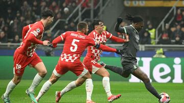 AC Milan's Portuguese forward #10 Rafael Leao scores his team's first goal during the UEFA Champions League football match between AC Milan and Girona at San Siro stadium in Milan, on January 22, 2025. (Photo by Alberto PIZZOLI / AFP)