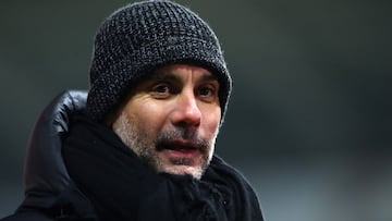 SWANSEA, WALES - FEBRUARY 10: Pep Guardiola, Manager of Manchester City reacts during a during The Emirates FA Cup Fifth Round match between Swansea City and Manchester City at Liberty Stadium on February 10, 2021 in Swansea, Wales. Sporting stadiums aro