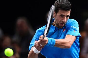 Djokovic returns the ball to Dimitrov during his win over the Bulgarian.