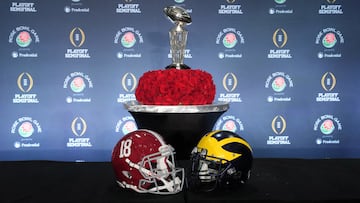 Alabama Crimson Tide and Michigan Wolverines helmets and the Leishman Trophy at the Rose Bowl coaches press conference at the Sheraton Grand  Mandatory Credit: Kirby Lee-USA TODAY Sports