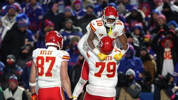 ORCHARD PARK, NEW YORK - JANUARY 21: Isiah Pacheco #10 of the Kansas City Chiefs celebrates with Donovan Smith #79 after scoring a touchdown against the Buffalo Bills during the fourth quarter in the AFC Divisional Playoff game at Highmark Stadium on January 21, 2024 in Orchard Park, New York.   Al Bello/Getty Images/AFP (Photo by AL BELLO / GETTY IMAGES NORTH AMERICA / Getty Images via AFP)