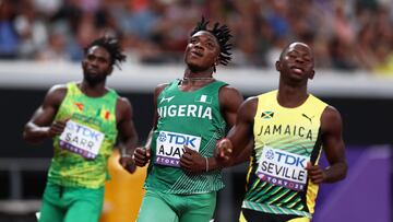 World Athletics Championships Tokyo 2025 - Men's 100m Round 1 - Japan National Stadium, Tokyo, Japan - September 13, 2025 Nigeria's Kayinsola Ajayi and Jamaica's Oblique Seville in action during the heats REUTERS/Eloisa Lopez