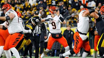 PITTSBURGH, PENNSYLVANIA - JANUARY 04: T.J. Watt #90 of the Pittsburgh Steelers hits Joe Burrow #9 of the Cincinnati Bengals as he throws the ball in the second quarter of a game at Acrisure Stadium on January 04, 2025 in Pittsburgh, Pennsylvania. Justin K. Aller/Getty Images/AFP (Photo by Justin K. Aller / GETTY IMAGES NORTH AMERICA / Getty Images via AFP)