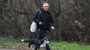 LONDON, ENGLAND - MARCH 12: Gary Lineker returns home with his dog on March 12, 2023 in London, England. Match of the Day anchor Gary Lineker was asked by the BBC to step back from presenting their flagship football highlights program, Match of the Day this weekend, until they agree on a social media policy. Lineker, a former England international football player and previous winner of the prestigious Golden Boot award, tweeted his own views on the government's Stop Small Boats policy provoking a row over the impartiality of freelance BBC TV presenters. Several pundit colleagues of Lineker's have also refused to appear on the show in solidarity. This week's show aired as a highlights package only with no punditry and many other BBC sports radio and TV shows were cancelled. (Photo by Hollie Adams/Getty Images)