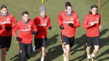 Griezmann, en el centro, con Lucas, Giménez, Godín y Filipe.