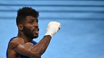 (FILES) In this file photo taken on August 08, 2021 Cuba's Andy Cruz celebrates after winning against USA's Keyshawn Daniel Webster Davis after their men's light (57-63kg) boxing final bout during the Tokyo 2020 Olympic Games at the Kokugikan Arena in Tokyo. - Olympic champion and AIBA World Championships triple gold medal winner, Cuban boxer Andy Cruz, did not appear on June 20, 2022 at the Playa Giron Tournament, Cuba�s national championship. (Photo by Luis ROBAYO / AFP)