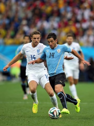 Nicolas Lodeiro y Jordan Henderson.