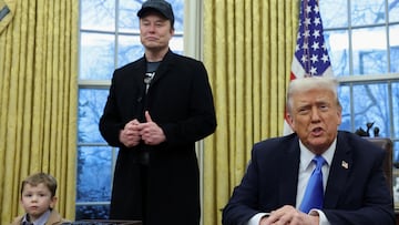 FILE PHOTO: U.S. President Donald Trump speaks next to Elon Musk and X Æ A-12, Musk's son, in the Oval Office of the White House in Washington, D.C., U.S., February 11, 2025. REUTERS/Kevin Lamarque/File Photo