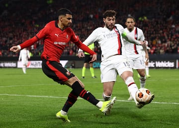 Soccer Football - Europa League - Play-Off - Second Leg -  Stade Rennes v AC Milan - Roazhon Park, Rennes, France - February 22, 2024 Stade Rennes' Ibrahim Salah in action with AC Milan's Theo Hernandez REUTERS/Stephanie Lecocq