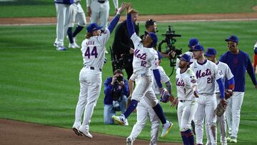 Oct 18, 2024; New York City, New York, USA; New York Mets outfielder Harrison Bader (44) celebrates with shortstop Francisco Lindor (12) following a win over the Los Angeles Dodgers during game five of the NLCS for the 2024 MLB playoffs at Citi Field. Mandatory Credit: Wendell Cruz-Imagn Images
