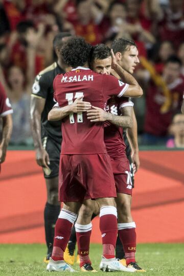 Coutinho and Salah hit the spot as Liverpool lift Premier League Asia Trophy - in pictures