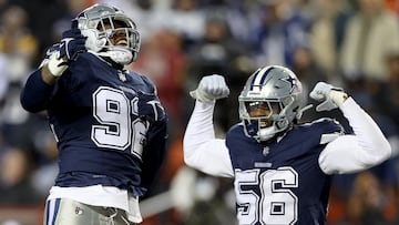 LANDOVER, MARYLAND - JANUARY 07: Dante Fowler Jr. #56 and Dorance Armstrong #92 of the Dallas Cowboys celebrate a sack during the fourth quarter against the Washington Commanders at FedExField on January 07, 2024 in Landover, Maryland.   Patrick Smith/Getty Images/AFP (Photo by Patrick Smith / GETTY IMAGES NORTH AMERICA / Getty Images via AFP)