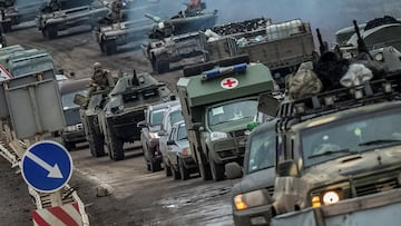 Ukrainian tanks and military vehicles are seen at a road, as Russia's attack on Ukraine continues, in Kherson region, Ukraine November 18, 2022. REUTERS/Viacheslav Ratynskyi