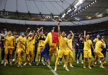 Romania celebrate their qualification for the Euro 2024 last 16.