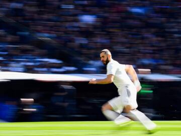 Real Madrid's French forward Karim Benzema runs during the Spanish League football match between Real Madrid and Girona at the Santiago Bernabeu stadium in Madrid on February 17, 2019. 
