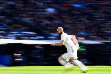 Real Madrid's French forward Karim Benzema runs during the Spanish League football match between Real Madrid and Girona at the Santiago Bernabeu stadium in Madrid on February 17, 2019. 