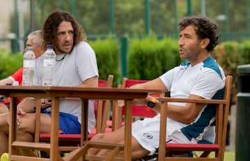 Carles Puyol y Luis Milla. 