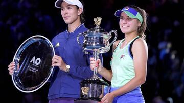 Sofia Kenin of the USA and Garbine Muguruza of Spain pose for photographs following the women's singles final on day 13 of the Australian Open tennis tournament at Rod Laver Arena in Melbourne, Saturday, February 1, 2020. (AAP Image/Michael Dodge) NO