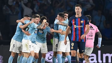 Celta de Vigo's players celebrate their win at the end of the Spanish league football match between RC Celta de Vigo and FC Barcelona at the Balaidos stadium in Vigo on June 4, 2023. (Photo by MIGUEL RIOPA / AFP)