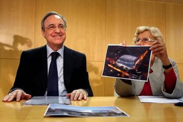 A happy Florentino with his new stadium, being held up by Madrid mayor Manuela Carmena