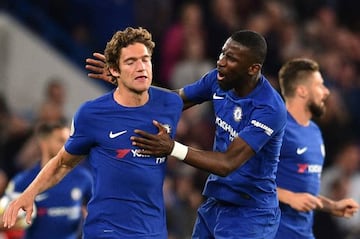 Marcos Alonso celebrates a goal against Huddersfield.