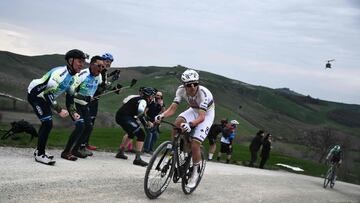 UAE Team Emirates's Slovenian Tadej Pogacar leads during the 20th one-day classic 'Strade Bianche' (White Roads) men's cycling race between Siena and Siena in Tuscany on March 7, 2026. (Photo by Marco BERTORELLO / AFP)