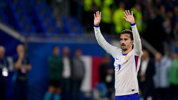 (FILES) France's midfielder #07 Antoine Griezmann (R) acknowledges the supporters at the end of the UEFA Nations League, League A - Group 2 first leg football match between France and Belgium at the Parc Olympique Lyonnais in Lyon on September 9, 2024. France vice-captain and 2018 world champion Antoine Griezmann announced his international retirement on his X (ex-Twitter) account on September 30, 2024, �with a heart full of memories�. (Photo by Olivier CHASSIGNOLE / AFP)