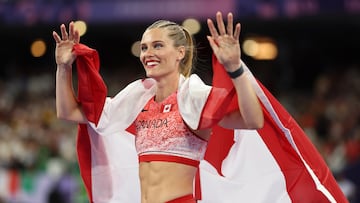PARIS, FRANCE - AUGUST 07: Bronze medalist Alysha Newman of Team Canada reacts after competing during the Women's Pole Vault Final on day twelve of the Olympic Games Paris 2024 at Stade de France on August 07, 2024 in Paris, France. (Photo by Cameron Spencer/Getty Images)