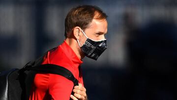 Paris Saint-Germain's German head coach Thomas Tuchel wearing protective face mask arrives at the team's " Camp des Loges " training grounds in Saint-Germain-en-Laye, west of Paris, on June 22, 2020. (Photo by FRANCK FIFE / AFP)