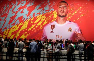 Real Madrid's Belgian midfielder Eden Hazard at the booth of the FIFA 20 during the media day of the Gamescom.