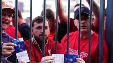 Liverpool fans stuck outside the ground show their match tickets during the UEFA Champions League Final at the Stade de France, Paris. Picture date: Saturday May 28, 2022. (Photo by Adam Davy/PA Images via Getty Images)