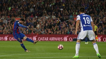 Soccer Football - Barcelona v Real Sociedad - Spanish La Liga Santander - Camp Nou stadium, Barcelona, Spain - 15/04/2017. Barcelona's Lionel Messi scores a goal against Real Sociedad's Yuri Berchiche in action. REUTERS/Albert Gea