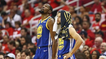 May 6, 2019; Houston, TX, USA; Golden State Warriors forward Kevin Durant (35) and guard Stephen Curry (30) look on during the third quarter against the Houston Rockets in game four of the second round of the 2019 NBA Playoffs at Toyota Center. Mandatory Credit: Troy Taormina-USA TODAY Sports