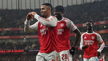 Arsenal's Brazilian striker #09 Gabriel Jesus (L) celebrates after scoring the team's fourth goal during the English FA Cup fourth round football match between Arsenal and Wigan Athletic at the Emirates Stadium in London on February 15, 2026. (Photo by Glyn KIRK / AFP) / RESTRICTED TO EDITORIAL USE. No use with unauthorized audio, video, data, fixture lists, club/league logos or 'live' services. Online in-match use limited to 120 images. An additional 40 images may be used in extra time. No video emulation. Social media in-match use limited to 120 images. An additional 40 images may be used in extra time. No use in betting publications, games or single club/league/player publications. /