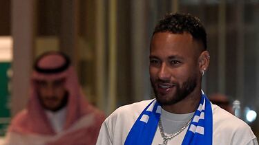 Brazilian forward Neymar arrives to Riyadh on August 18, 2023 after signing for Al-Hilal on a two-year contract. The 31-year-old Brazil forward who will be unveiled as an Al-Hilal player on August 19 after six seasons with French champions Paris Saint-Germain landed in a Riyadh airport equipped with extra security for the occasion. (Photo by AFP)