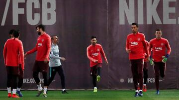 Soccer Football - Champions League - FC Barcelona Training - Ciutat Esportiva Joan Gamper, Barcelona, Spain - March 12, 2019 Barcelona's Lionel Messi and Sergio Busquets during training REUTERS/Susana Vera