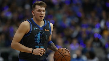 (FILES) DALLAS, TEXAS - DECEMBER 16: Luka Doncic #77 of the Dallas Mavericks at American Airlines Center on December 16, 2018 in Dallas, Texas. NOTE TO USER: User expressly acknowledges and agrees that, by downloading and or using this photograph, User is consenting to the terms and conditions of the Getty Images License Agreement. The Dallas Mavericks are sending star guard Luka Doncic to the Los Angeles Lakers for Anthony Davis in a stunning three-team NBA trade reported on February 1, 2025, by ESPN. The deal will see Slovenian star Doncic, a 25-year-old five-time All-Star who led the Mavericks to the NBA Finals last season, join forces with 40-year-old superstar LeBron James in Los Angeles. (Photo by RONALD MARTINEZ / GETTY IMAGES NORTH AMERICA / AFP)