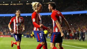 Griezmann celebra con Sa&uacute;l su gol al Barcelona. 