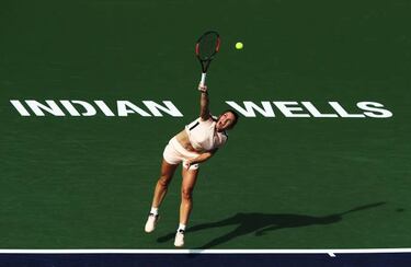 Halep overcomes stuttering start to progress at Indian Wells