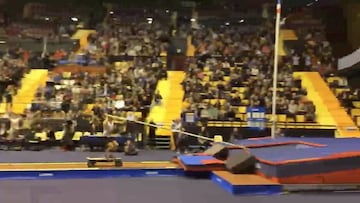 Surreal pole vault jump with the aid of a skateboard