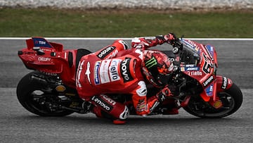 Ducati Lenovo Team's Italian rider Francesco Bagnaia rides during the first free practice of the MotoGP Malaysian Grand Prix at the Sepang International Circuit in Sepang on October 24, 2025. (Photo by Lillian SUWANRUMPHA / AFP)