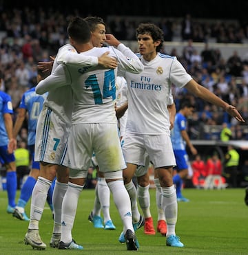 Casemiro celebrates with Cristiano Ronaldo and Jesús Vallejo.