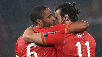 Ashley Williams and Gareth Bale celebrate Wales qualifying for Euro 2016 