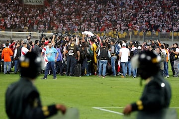 Soccer Football - Peru v New Zealand - 2018 World Cup Qualifying Playoffs - National Stadium, Lima, Peru - November 15, 2017. Peru's players celebrate their victory among members of the media. REUTERS/Mariana Bazo