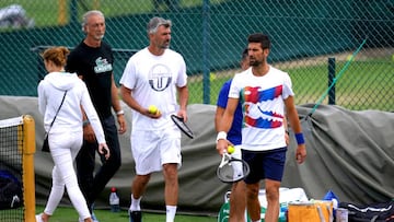 Novak Djokovic (right) during a practice session ahead of the 2022 Wimbledon Championship at the All England Lawn Tennis and Croquet Club, Wimbledon. Picture date: Saturday June 25, 2022. (Photo by John Walton/PA Images via Getty Images)