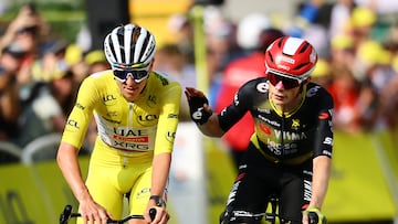 Cycling - Tour de France - Stage 10 - Ennezat to Mont-Dore - Ennezat, France - July 14, 2025 UAE Team Emirates XRG's Tadej Pogacar reacts crossing the finish line in ninth place in Stage 10 with tenth placed Team Visma | Lease a Bike's Jonas Vingegaard REUTERS/Sarah Meyssonnier