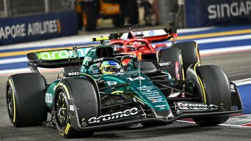 Fernando Alonso (Aston Martin AMR24) y Charles Leclerc (Ferrari SF-24). Marina Bay, Singapur. F1 2024.